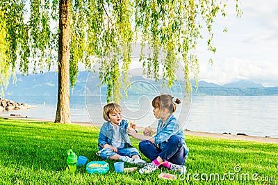 Kids having fun outdoors Stock Photo