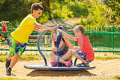 Kids having fun on playground. Stock Photo