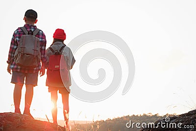 Kids hiking with backpacks, Relax time on holiday concept travel Stock Photo