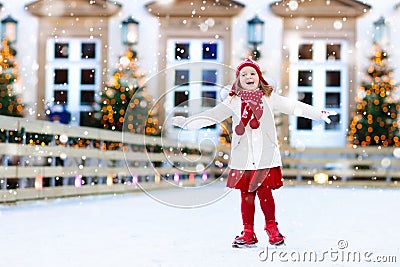 Kids ice skating in winter. Ice skates for child. Stock Photo