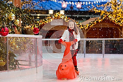 Kids ice skating in winter. Ice skates for child Stock Photo