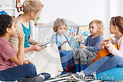 Kids with instruments Stock Photo