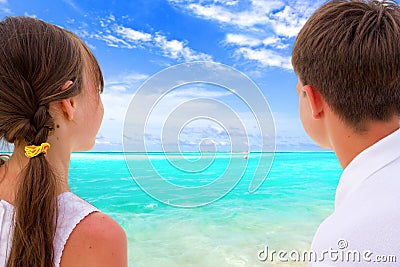 Kids looking at beach Stock Photo