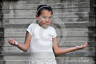 Kids Making A Decision Wearing Hair Band Near Wall Stock Photo