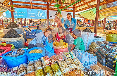 Kids in market stall, Kakku, Myanmar Editorial Stock Photo