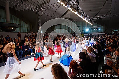 Kids models going down the catwalk at Fashion Week show Editorial Stock Photo