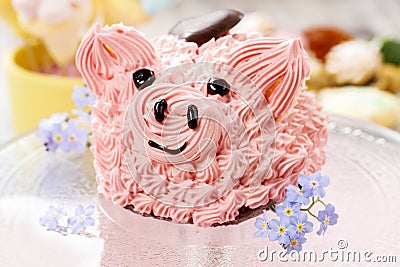 Kids party: cute pink piglet cake Stock Photo