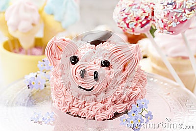 Kids party: cute pink piglet cake Stock Photo