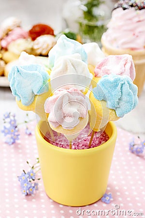 Kids party: marshmallow cake pops in yellow bucket Stock Photo