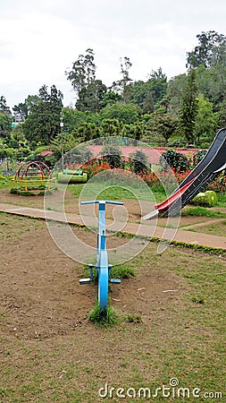 Kids play area from Bryant Park with beautiful scenic flower garden background Stock Photo