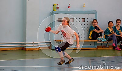 Kids play handball indoor. Sports and physical activity. Training and sports for children Editorial Stock Photo