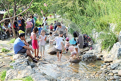 Kids play water at Gwangmyeong Cave in south korea Editorial Stock Photo