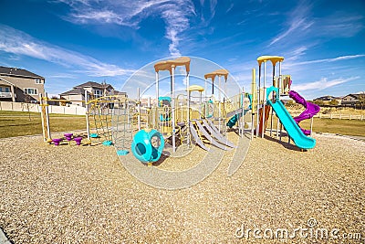 Kids playground with colorful blue slides during day Stock Photo