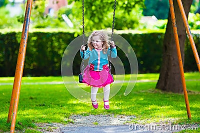 Kids on playground swing