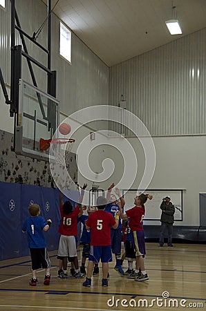 Kids playing basketball match Editorial Stock Photo