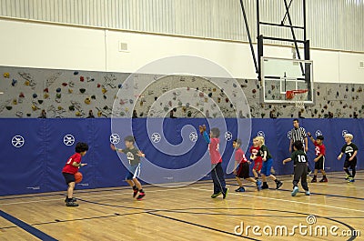 Kids playing basketball match Editorial Stock Photo