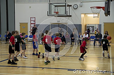 Kids playing basketball match Editorial Stock Photo