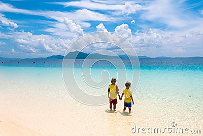 Kids playing on beach. Children play at sea Stock Photo