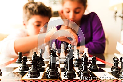 Kids playing Chess Stock Photo
