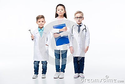 Kids playing doctors Stock Photo