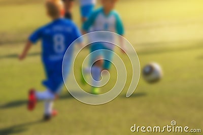 Kids playing soccer Stock Photo