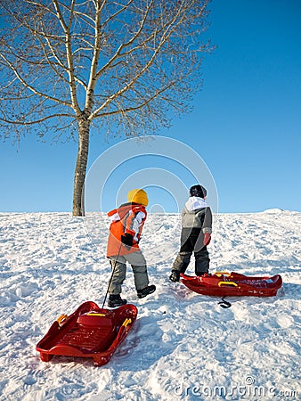 Kids playing in winter Stock Photo