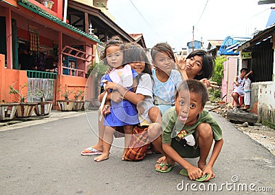 Kids posing on street of Manado Editorial Stock Photo