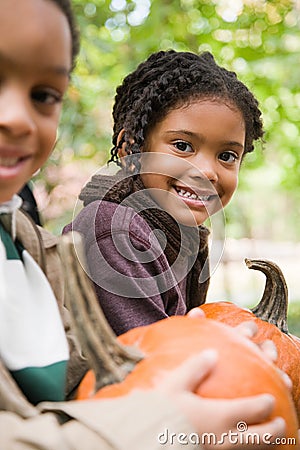 Kids with pumpkins Stock Photo