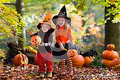 Kids with pumpkins on Halloween Stock Photo