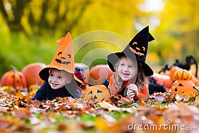 Kids with pumpkins on Halloween Stock Photo