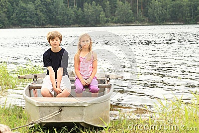 Kids in punt Stock Photo