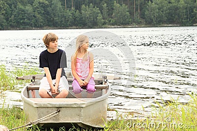 Kids in punt Stock Photo