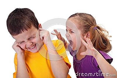 Kids quarrel - little girl shouting in anger Stock Photo
