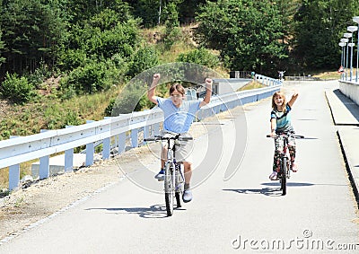 Kids riding bikes Stock Photo