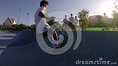 Kids Riding Kick Scooter Tailwhip Jump Flip Air Trick Skatepark Bowl