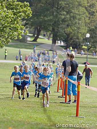 Kids running during the Generation PEP day in Hagaparken, to make kids be more physical active and more healthy Editorial Stock Photo