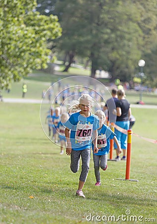 Kids running during the Generation PEP day in Hagaparken, to make kids be more physical active and more healthy Editorial Stock Photo