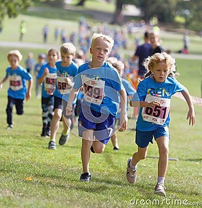 Kids running during the Generation PEP day in Hagaparken, to make kids be more physical active and more healthy Editorial Stock Photo