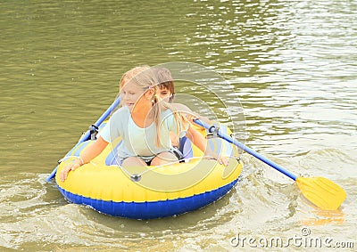 Kids sailing in punt Stock Photo