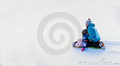 Kids Sledding Down Snow Hill on Sled Fast Speed Stock Photo