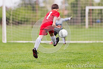 Kids soccer football - children players match on soccer field Stock Photo