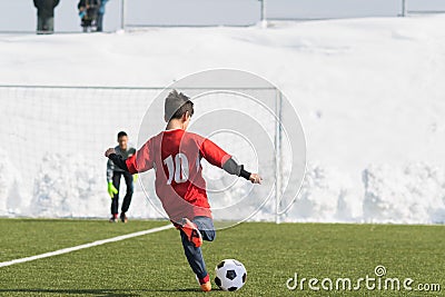 Kids soccer football tournament - children players match on socc Stock Photo