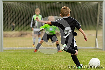 Kids soccer penalty kick Stock Photo