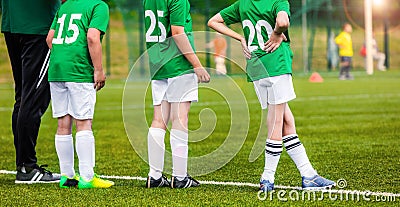 Kids of Soccer Team with Coach on Pitch. Young Soccer Players Editorial Stock Photo