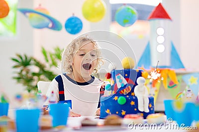 Kids space theme birthday party with cake Stock Photo