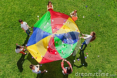 Kids standing in a circle and playing social game Stock Photo