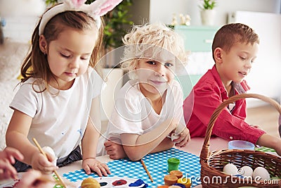 Kids start decorating easter eggs Stock Photo