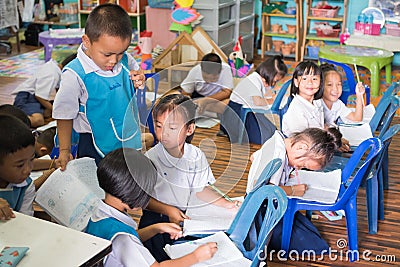 Kids studying in the classroom Editorial Stock Photo