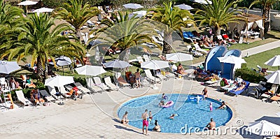 Kids Swimming pool with people - holidays concept Editorial Stock Photo