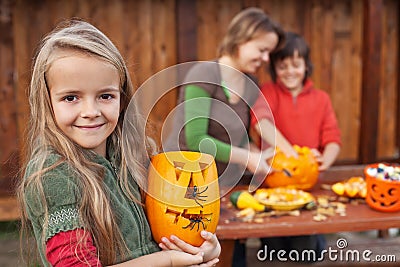 Kids and their mother preparing for Halloween Stock Photo